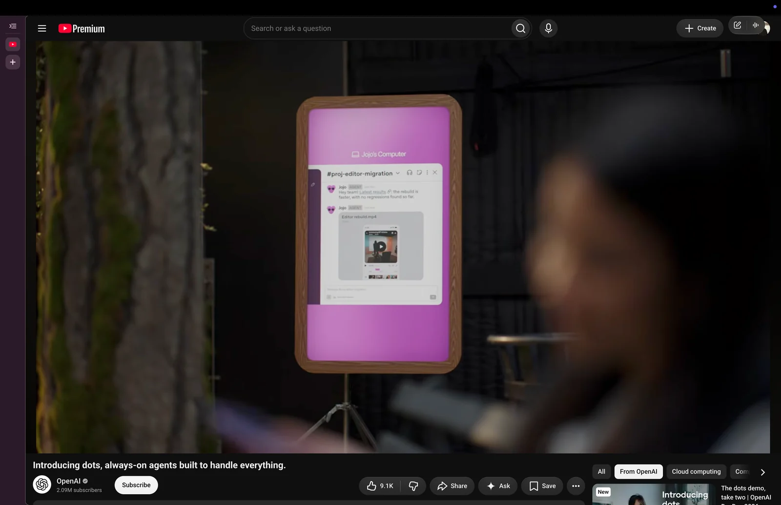 Still from a promo video showing a screen on a tripod displaying a conversation with a Dot